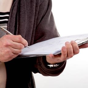 Man Filling in a safety Document